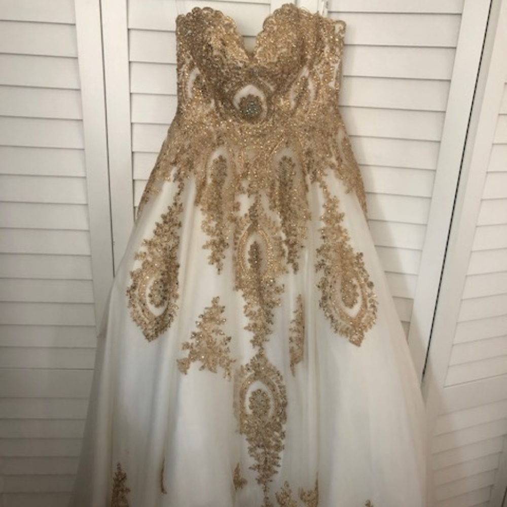 Formal white gown with gold detail